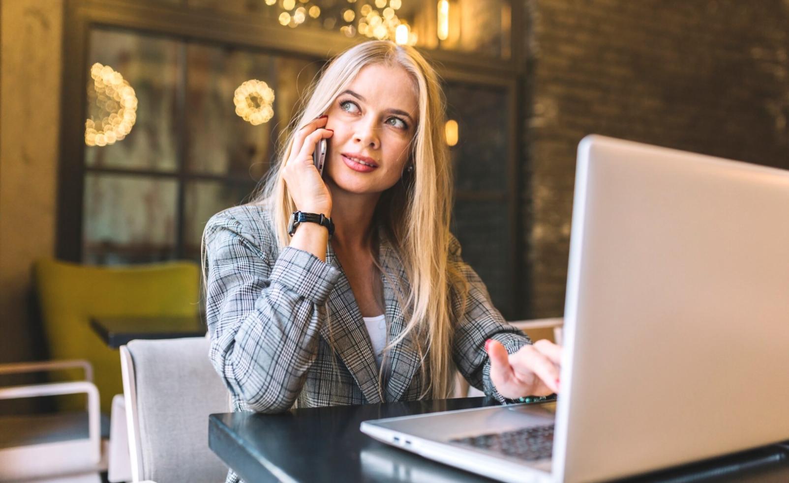 Students working on network troubleshooting exercises in modern learning environment